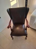 Fauteuil van leer met hout., Ophalen