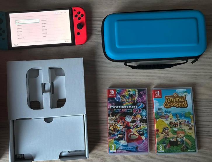 Nintendo Switch OLED + Mario Kart 8 & Animal Crossing, Spelcomputers en Games, Spelcomputers | Nintendo Switch, Zo goed als nieuw