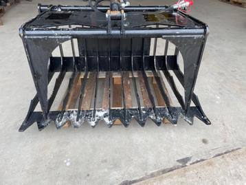 pelikaanbak Skidster Giant Schranklader Mestklem bobcat beschikbaar voor biedingen