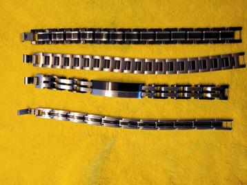 4 heren armbanden, 3 x staal, 1 x titanium. beschikbaar voor biedingen