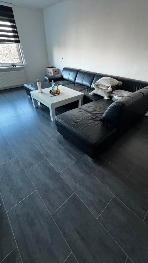 Bank van leer, Huis en Inrichting, Stoffering | Vloerbedekking, Zo goed als nieuw, Tapijt, 75 m² of meer, Ophalen of Verzenden