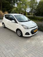 Hyundai i10 1.0i 66pk 2016 Wit, Auto's, Stof, 4 stoelen, Origineel Nederlands, Handgeschakeld