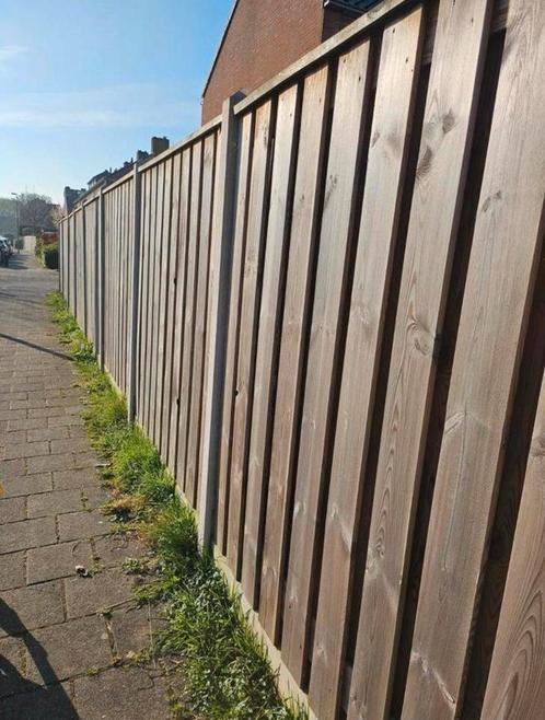Gebruikte Schutting met betonnen palen, Tuin en Terras, Schuttingen, Zo goed als nieuw, Hout, 1 tot 2 meter, 6 meter of meer, Ophalen