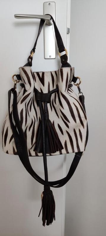 Leren schoudertas van het merk Donchoo. beschikbaar voor biedingen