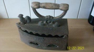 Gietijzeren strijkijzers beschikbaar voor biedingen