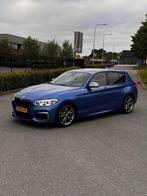 BMW 1 serie M135i LCI Xdrive | M Performance uitlaat | 326PK, USB, Zwart, Blauw, Alcantara