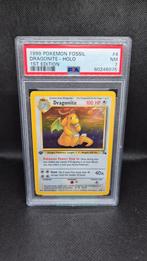 Dragonite Holo 1st Edition Fossil PSA 7 (Bekijk andere ads!), Ophalen of Verzenden, Zo goed als nieuw