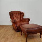 Vintage lederen fauteuil met hocker, oorfauteuil, Huis en Inrichting, Valkenswaard, Gebruikt, Info@flashbackfurniture.nl, Flashback Furniture