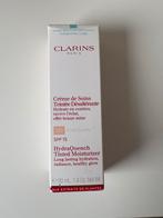 Clarins tinted moisturizer ZGAN, Ophalen of Verzenden, Zo goed als nieuw, Gehele gezicht