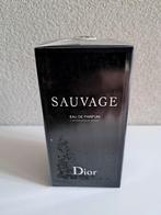 Dior Sauvage Eau De Parfum 100ml, nieuw en ongeopend., Sieraden, Tassen en Uiterlijk, Uiterlijk | Parfum, Ophalen of Verzenden