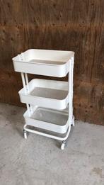 Witte ikea trolley, Ophalen