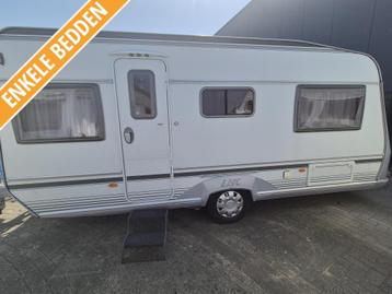 LMC Dominant 475 TE enkele bedden 2007,mover, tent 9650,- beschikbaar voor biedingen