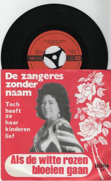De Zangeres Zonder Naam – Als De Witte Rozen Bloeien Gaan beschikbaar voor biedingen
