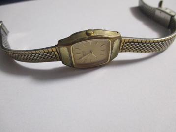 GEBRUIKTE SEIKO QUARTZ  ORIGINEEL GOUD 100% WERKING beschikbaar voor biedingen