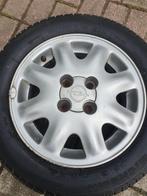 Kadett E Cabrio Velg + Band, Ophalen of Verzenden, Gebruikt