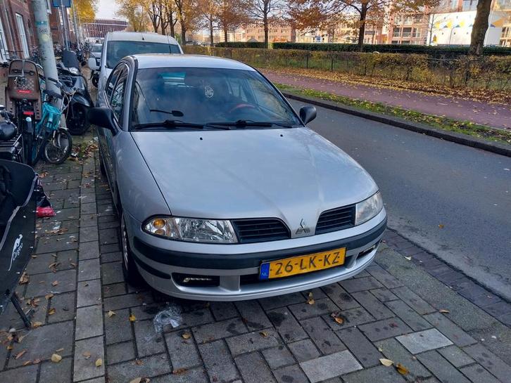 Mitsubishi Carisma 1.6 Shogun HB 2003 Grijs, Auto's, Mitsubishi, Particulier, Carisma, Benzine, C, Hatchback, Handgeschakeld, Origineel Nederlands