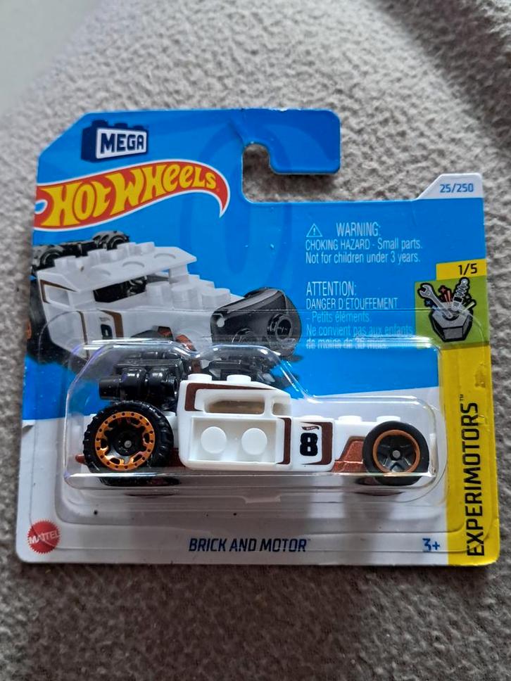 Hot Wheels Brick and Motor nieuw in verpakking licht beschad, Hobby en Vrije tijd, Modelauto's | Overige schalen, Nieuw, Ophalen of Verzenden