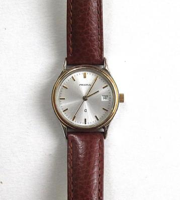 Vintage Prisma dames quartz polshorloge met kalender.   beschikbaar voor biedingen