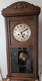 Oude bakregulateur klok, Ophalen