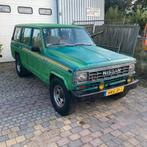 Nissan patrol Lang benzine bouwjaar 1984, Auto's, 121 pk, Beige, Leder en Stof, Handgeschakeld