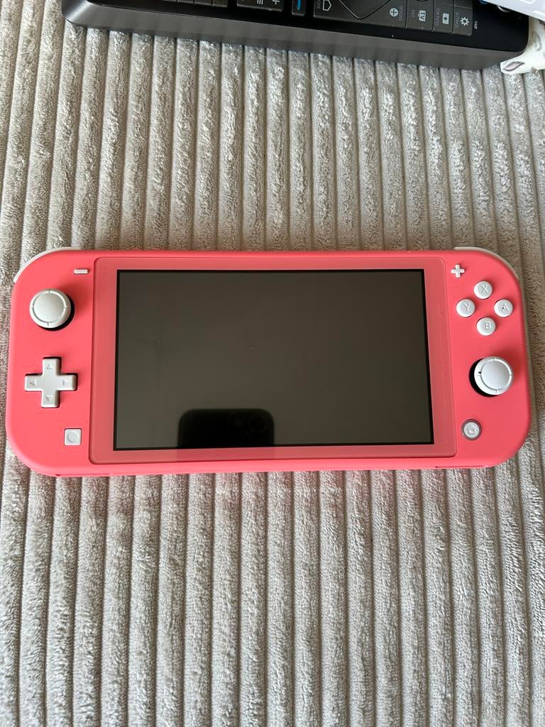 Nintendo Switch Lite Coral - Zo goed als nieuw, Spelcomputers en Games, Spelcomputers | Nintendo Switch Lite, Zo goed als nieuw