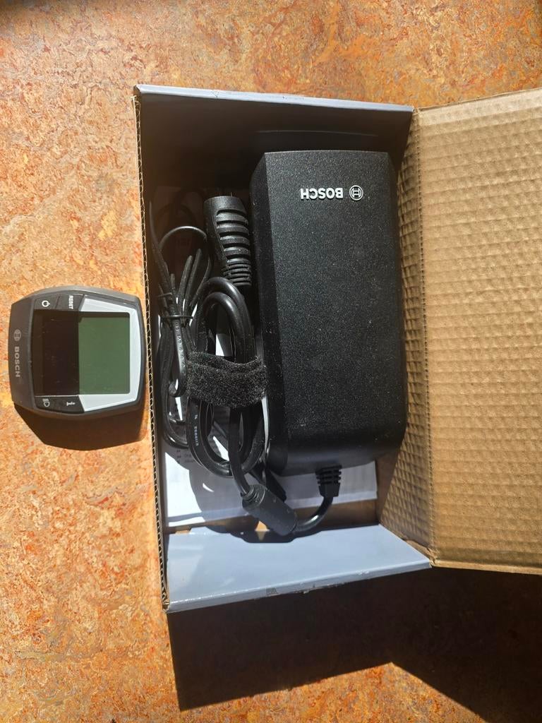 Bosch Oplader 6A & Intuvia Fietscomputer E-bike, Fietsen en Brommers, Fietsaccessoires | Fietsaccu's, Ophalen of Verzenden, Zo goed als nieuw