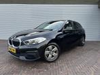 BMW 1-serie 118i lage km (bj 2020), Met garantie (alle), Zwart, Origineel Nederlands, Bedrijf