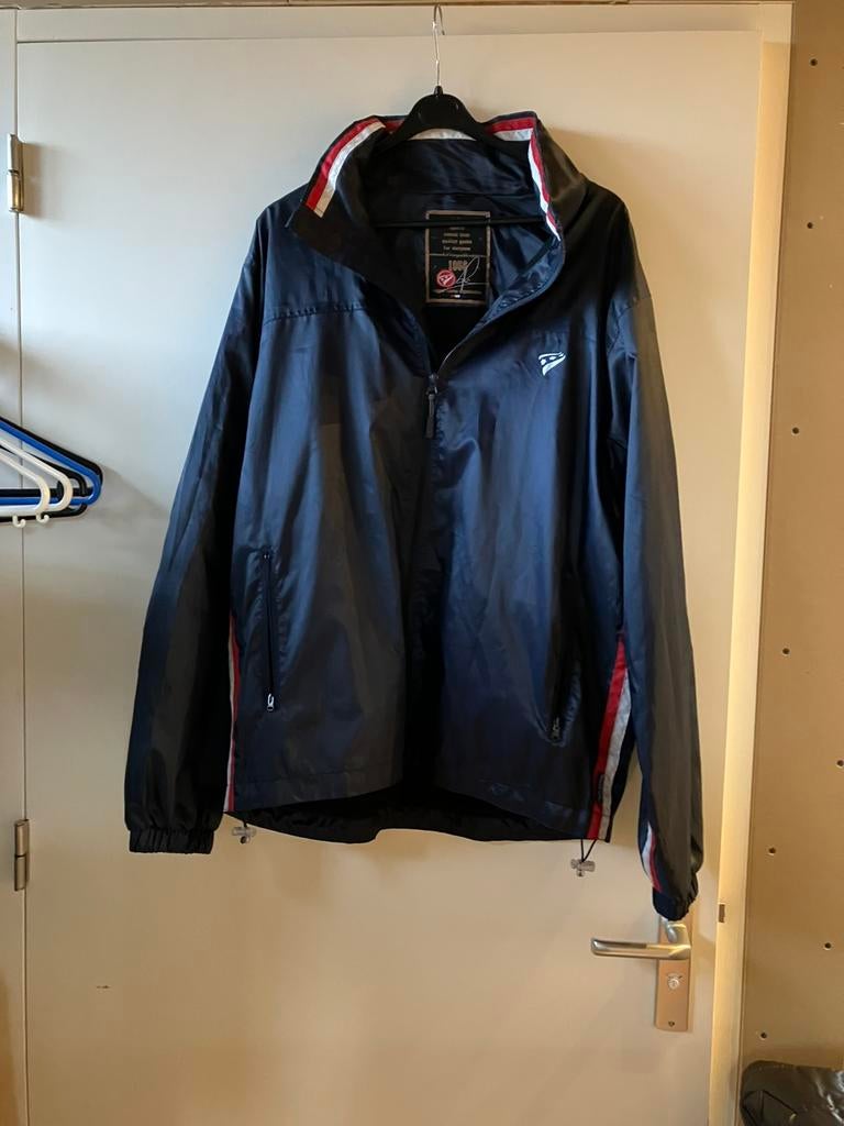 Rucanor regenjas blauw mt. L zga nieuw windjack, Ophalen, Zo goed als nieuw, Blauw