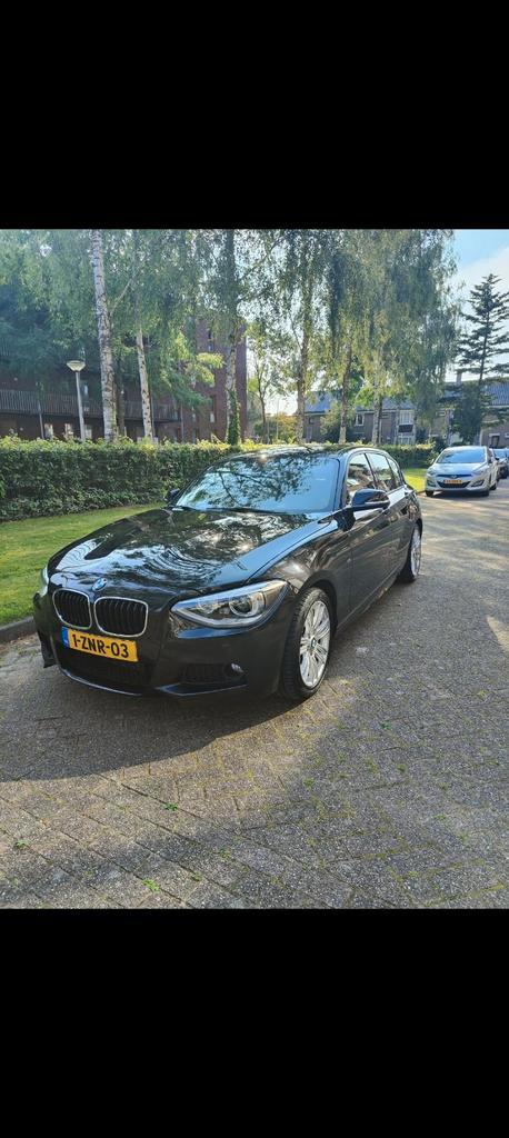 BMW 1-Serie 116i 136PK 5D 2015 Zwart, Auto's, BMW, Particulier, 1-Serie, ABS, Adaptieve lichten, Airbags, Airconditioning, Alarm