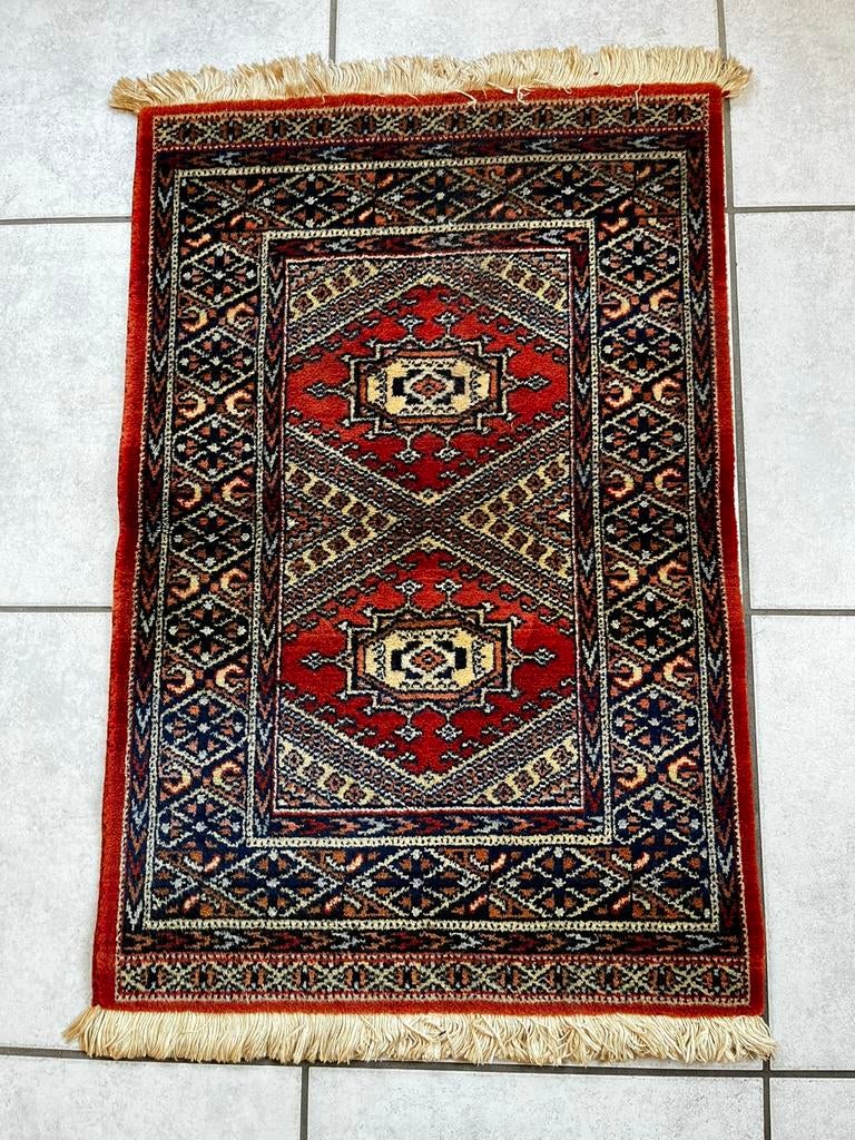 Perzisch tapijt, Ophalen