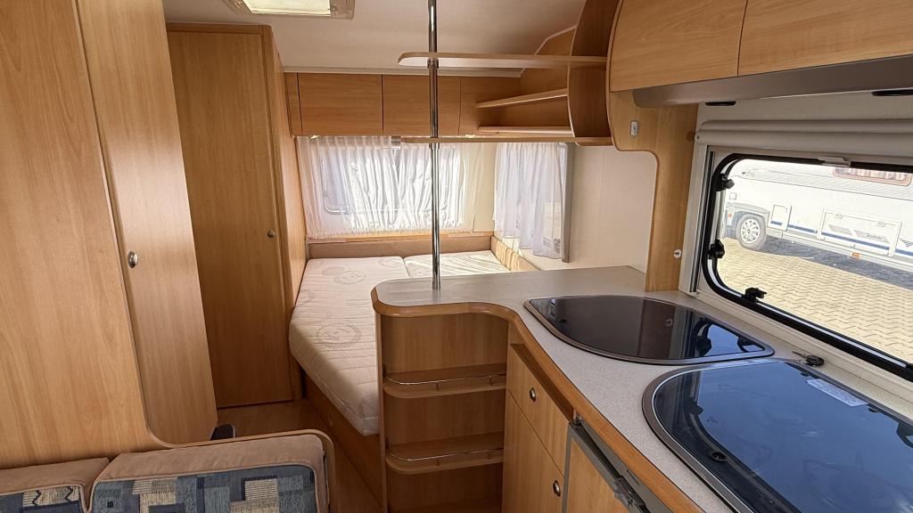 Home-Car Racer 43 TMF bouwjaar 2005 met (zak)luifel, Caravans en Kamperen, Caravans, Home-car, Bedrijf, Treinzit, 750 - 1000 kg