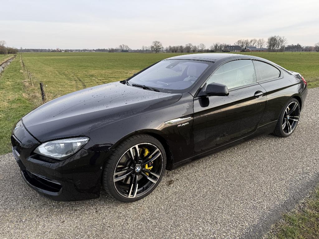 BMW 6-Serie 650i Coupé 4.4 300kW/408pk Xdrive 2012 Zwart, Automaat, 1820 kg, Zwart, Leder