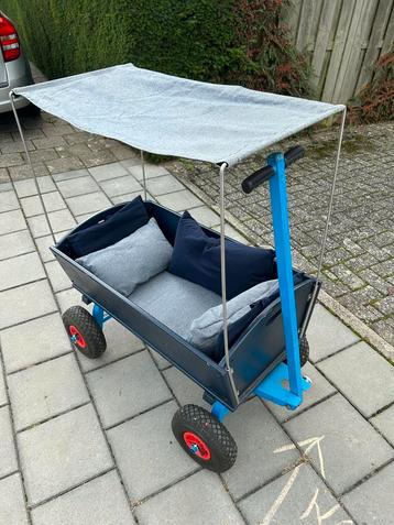 Bolderkar met zonnescherm en kussens beschikbaar voor biedingen