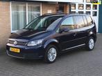 Volkswagen Touran 1.6 TDI Edition Automaat 7persoons, Euro 5, Stof, Gebruikt, Zwart