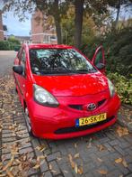 Toyota Aygo 1.0 12V Vvt-i 5DRS 2006 Rood, Auto's, Voorwielaandrijving, 4 stoelen, 68 pk, Origineel Nederlands