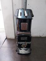 Mooie houtkachel, Ophalen