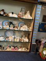 Verzameling poezenbeeldjes, Ophalen