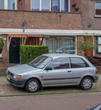 Toyota Starlet 1.3 XLI AUT E2 1995 Grijs, Auto's, 74 pk, 4 cilinders, Starlet, 400 kg