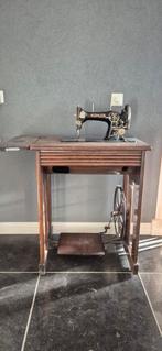 Köhler naaimachine tafel, Ophalen