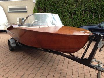 Klassieke houten speedboot met trailer, motor en papieren
