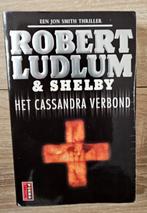Robert Ludlum & Philip Shelby - Het Cassandra verbond, Ophalen of Verzenden, Zo goed als nieuw, P. Shelby; Robert Ludlum