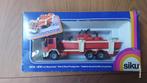 Siku 2823 Ford met motorboot, Hobby en Vrije tijd, Modelauto's | 1:50, Ophalen of Verzenden, Zo goed als nieuw, Bus of Vrachtwagen