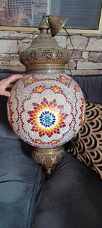 Arabische lamp mozaïek, Ophalen