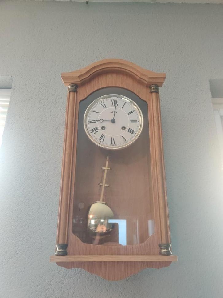 AMS slinger wandklok blank eiken en Nufa kalenderklok, Huis en Inrichting, Woonaccessoires | Klokken, Gebruikt, Wandklok, Ophalen