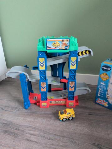 Vtech toet toet auto 4in1 stuntbaan incl orginele doos. beschikbaar voor biedingen