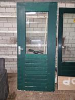 Merbau buitendeur met glas, Ophalen