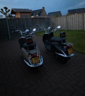 2x AGM retro scooters