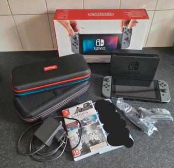 Ninendo switch met 2 spellen. beschikbaar voor biedingen