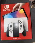 Nintendo switch oled, Met 2 controllers, Ophalen of Verzenden, Zo goed als nieuw, Met games