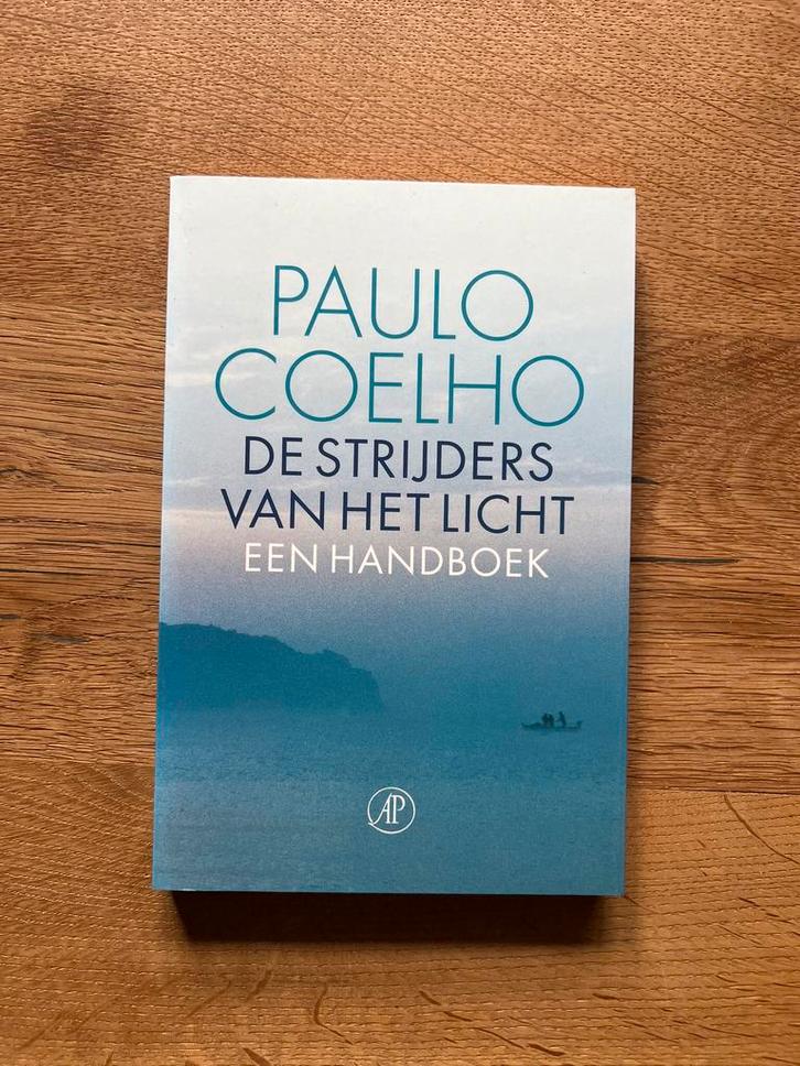 Paulo Coelho - De strijders van het licht, Boeken, Overige Boeken, Zo goed als nieuw, Ophalen of Verzenden